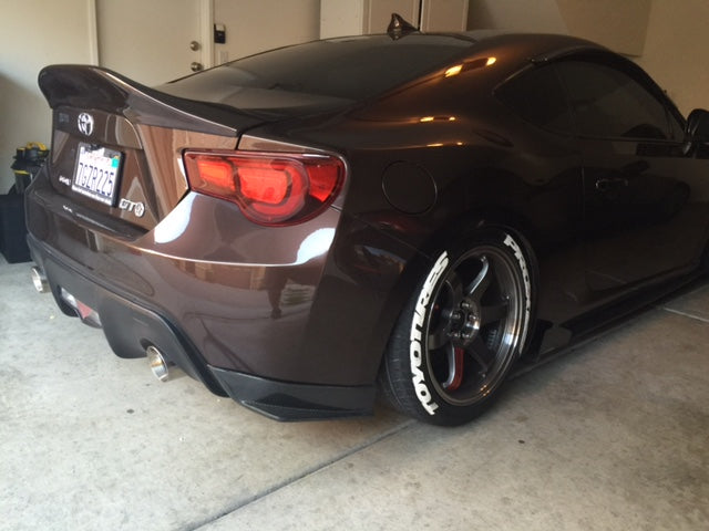 Rear bumper corner view of JSAI Aero aftermarket body kit detail showing fitment and finish