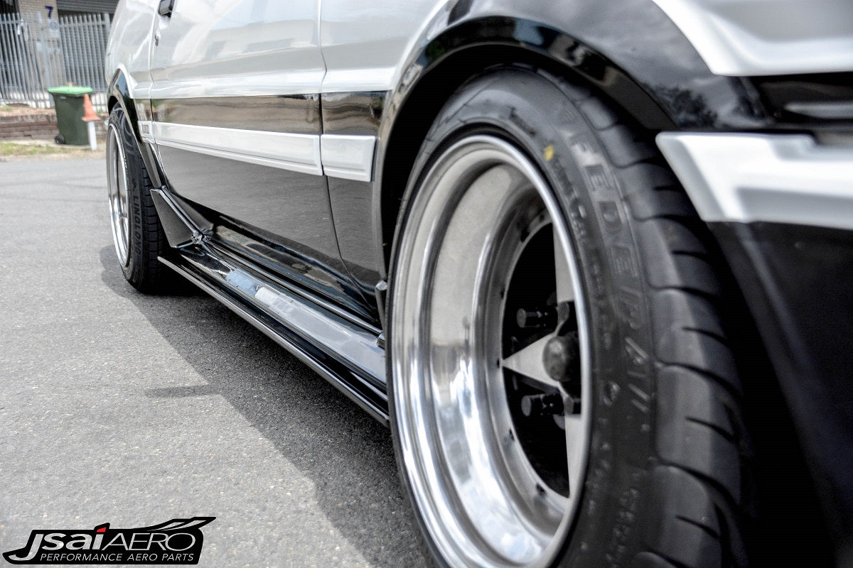 Toyota AE86 Levin Trueno Zenki style side skirts by JSAI Aero, aftermarket body kit upgrade for classic JDM Sprinter enhancing side profile and styling