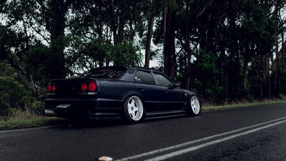 Black Nissan Skyline R34 with JSAI Aero side skirts performance aero body kit