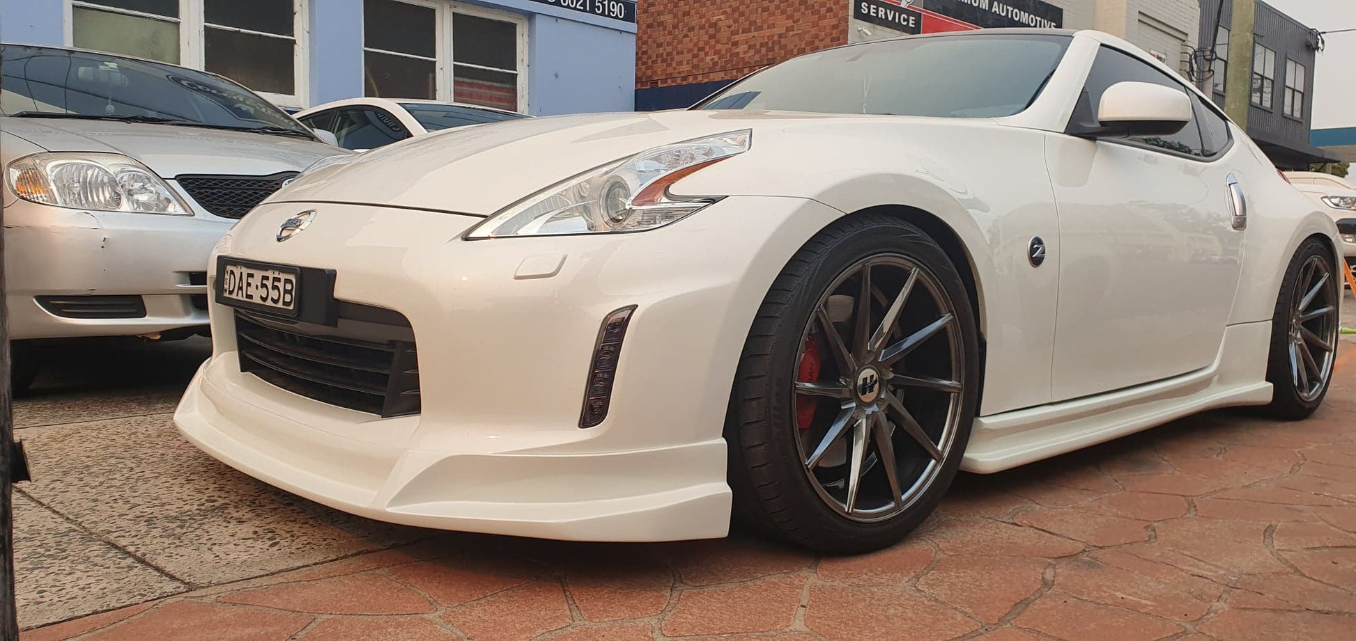 JSAI AERO SLR Kouki style front lip for Nissan 370Z side profile view, premium aftermarket aero body kit component improving airflow, aggressive stance, and performance build aesthetics.