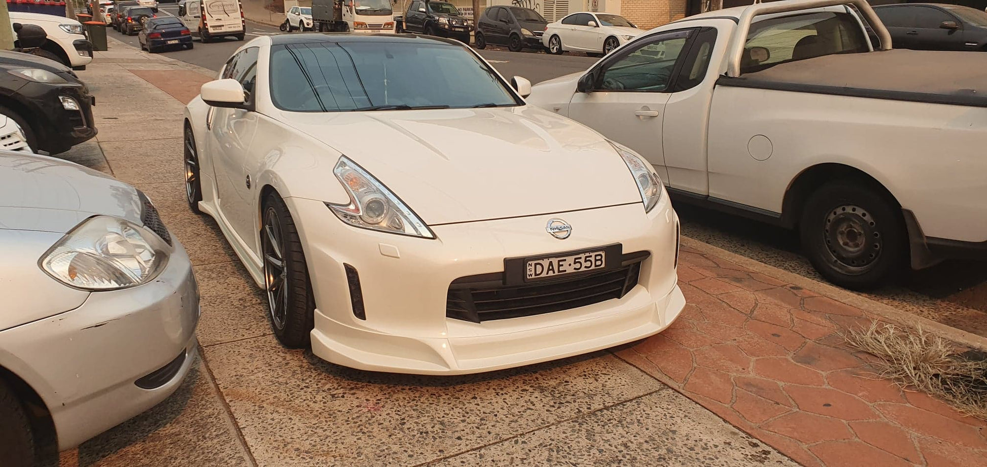 JSAI AERO SLR Kouki style painted front lip for Nissan 370Z, premium aftermarket aero body kit component improving airflow, aggressive stance, and ready-to-install performance styling.