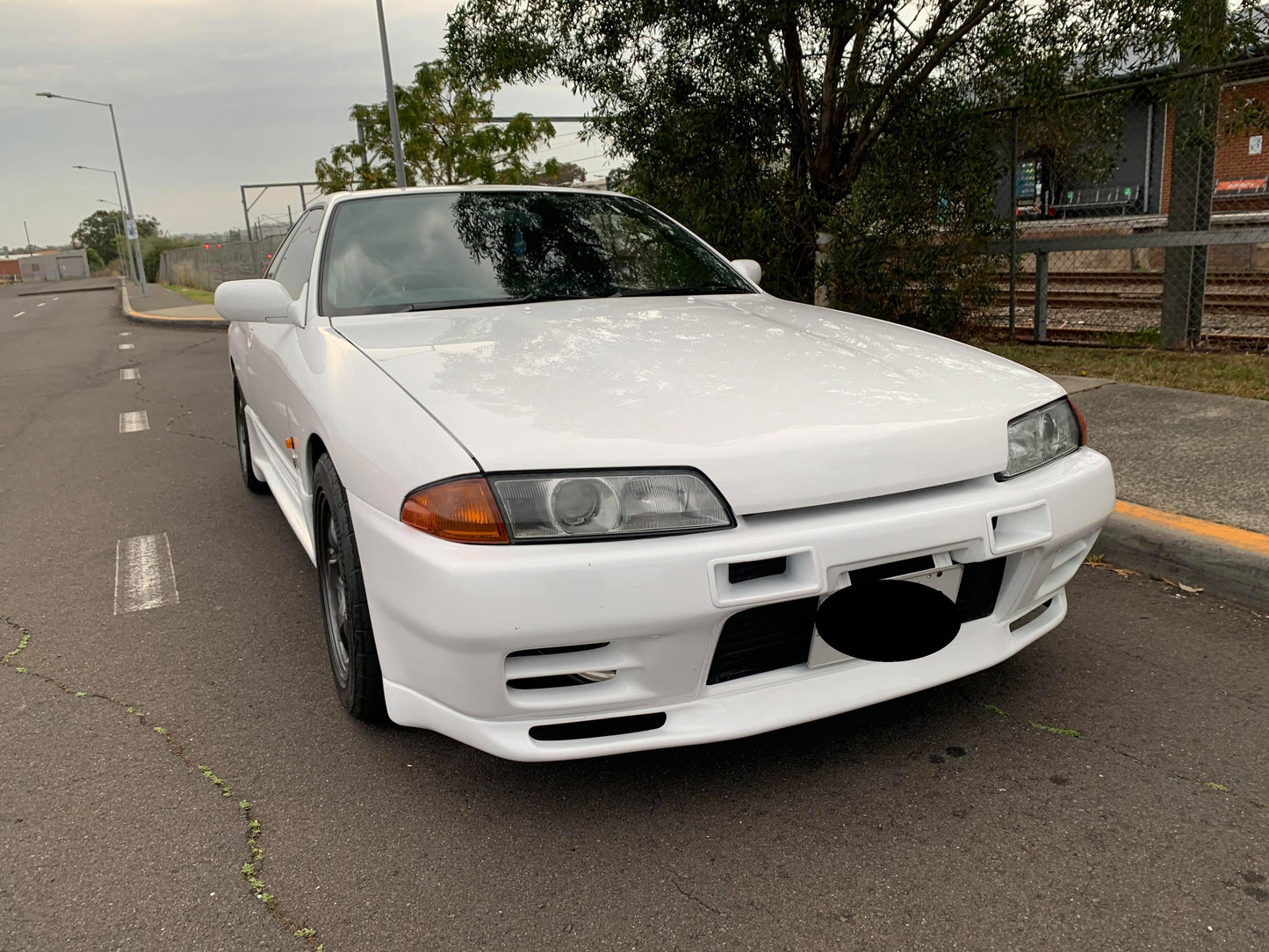 Nissan Skyline GT-R fitted with JSAI AERO front bumper, side skirts and rear aero styling, showcasing a modified performance build.