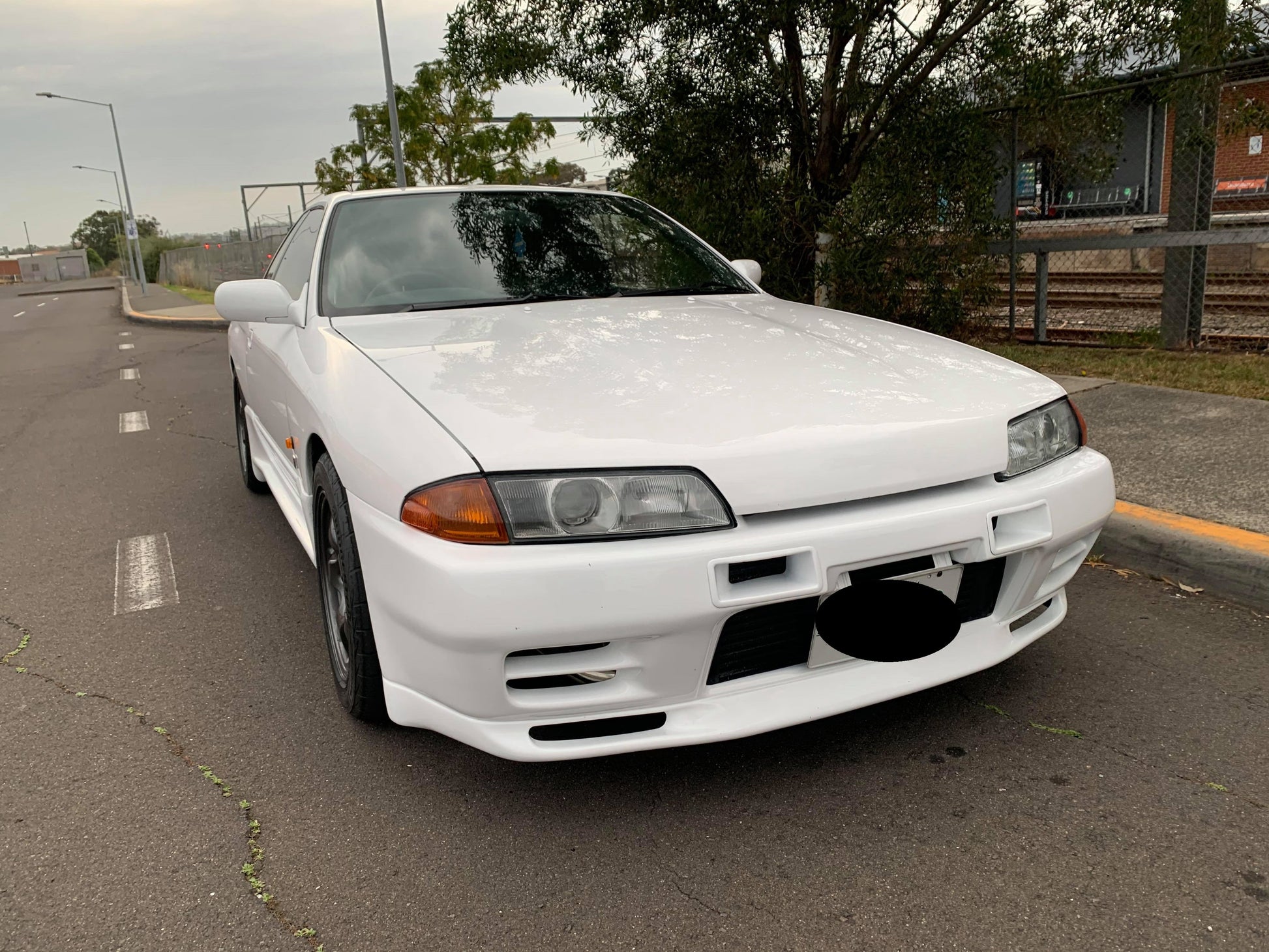 Nissan Skyline GT-R fitted with JSAI AERO front bumper, side skirts and rear aero styling, showcasing a modified performance build.