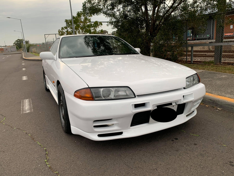 Nissan Skyline GT-R fitted with JSAI AERO front bumper, side skirts and rear aero styling, showcasing a modified performance build.