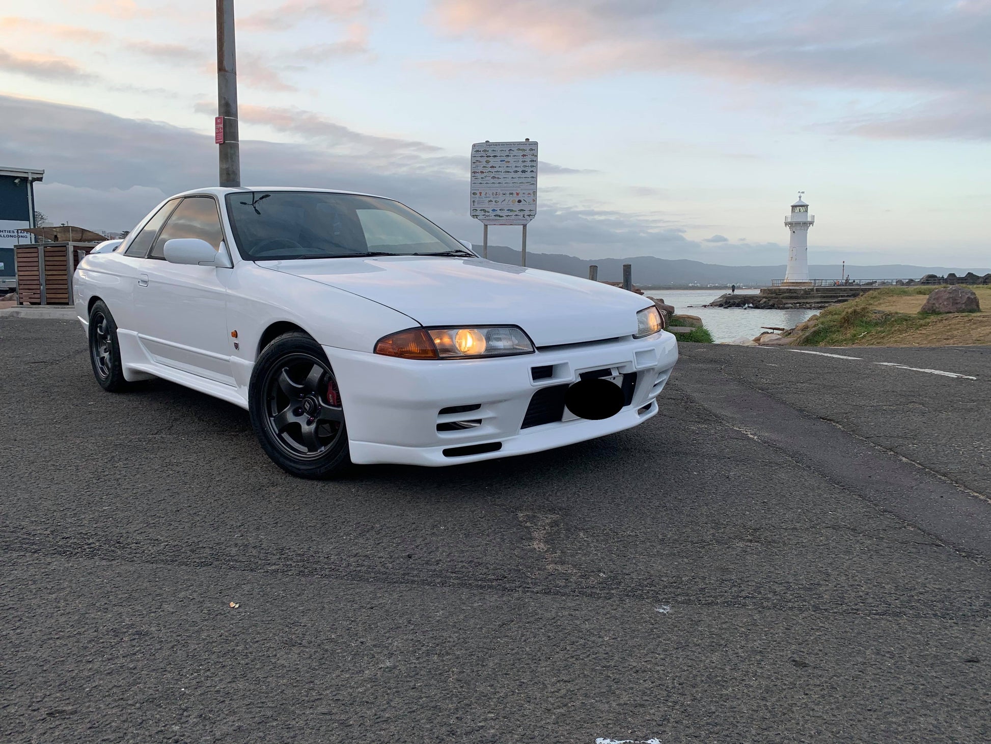 Customer with modified performance car fitted with JSAI AERO body kit and aero parts, showcasing aggressive styling and performance upgrades.