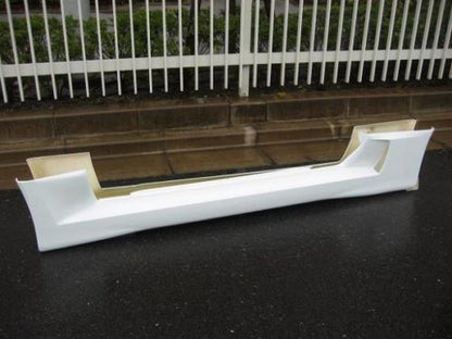 White fibreglass side skirt body kit panel for a performance car