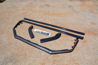 Aftermarket front lip and side skirt extension kit unpainted parts layout for body kit upgrade