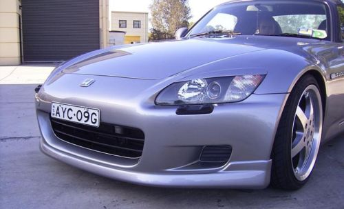 Honda S2000 AP1 front lip installed showcasing improved aerodynamics and aggressive front bumper styling