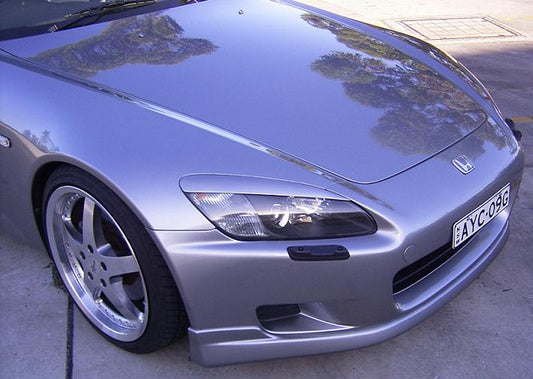 Honda S2000 AP1 JS Racing eyelid headlight cover enhancing aggressive styling and sleek front-end design