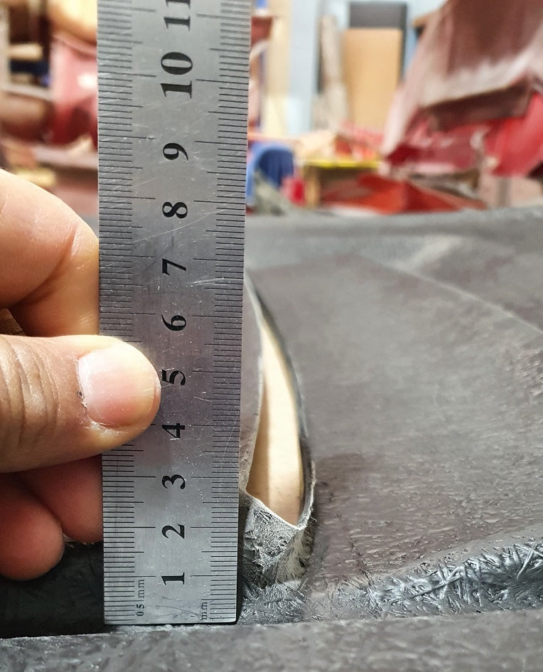 JSAI Aero fiberglass body kit panel measurement using ruler during manufacturing quality check