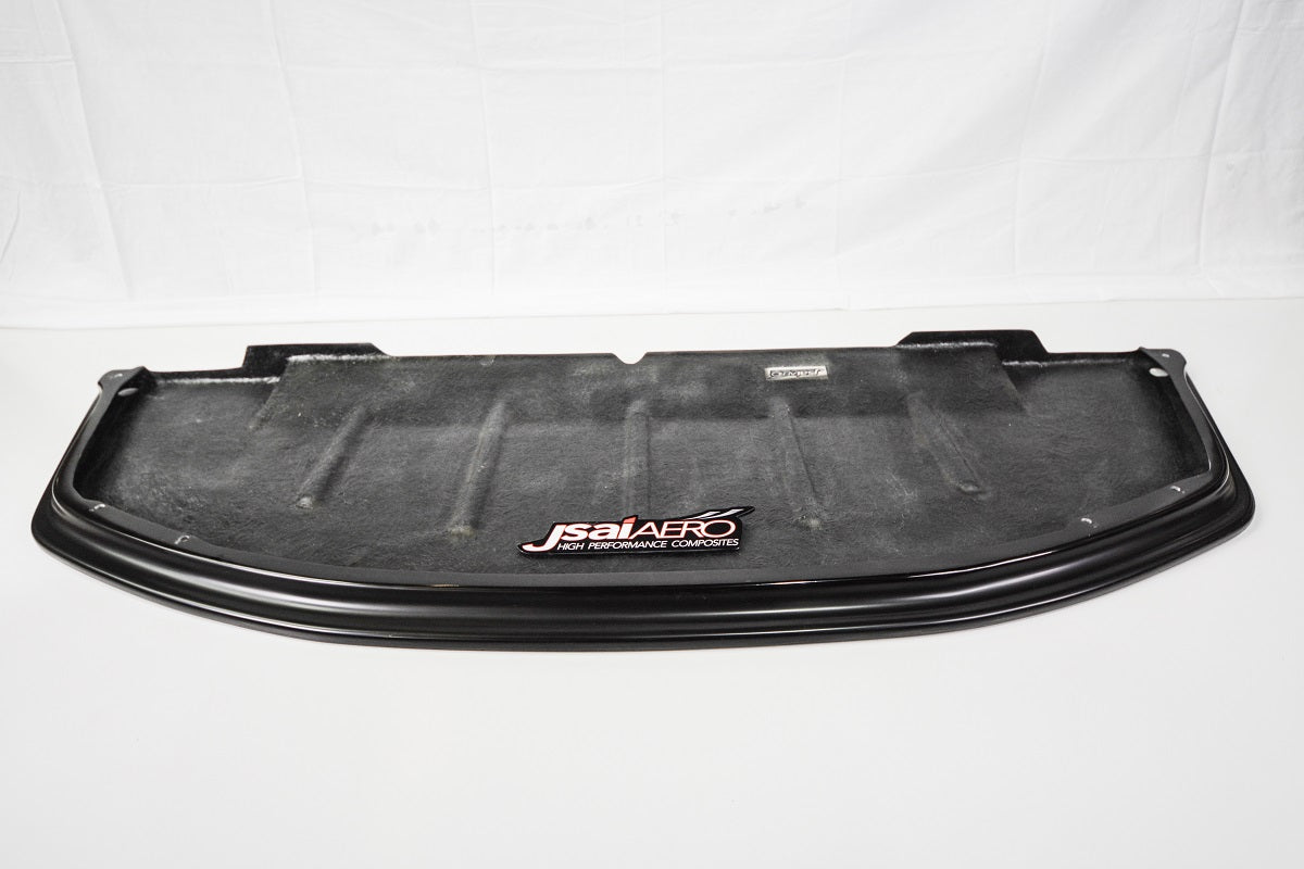 JSAI Aero fibreglass front lip panel shown from the underside with black edge trim and mounting points