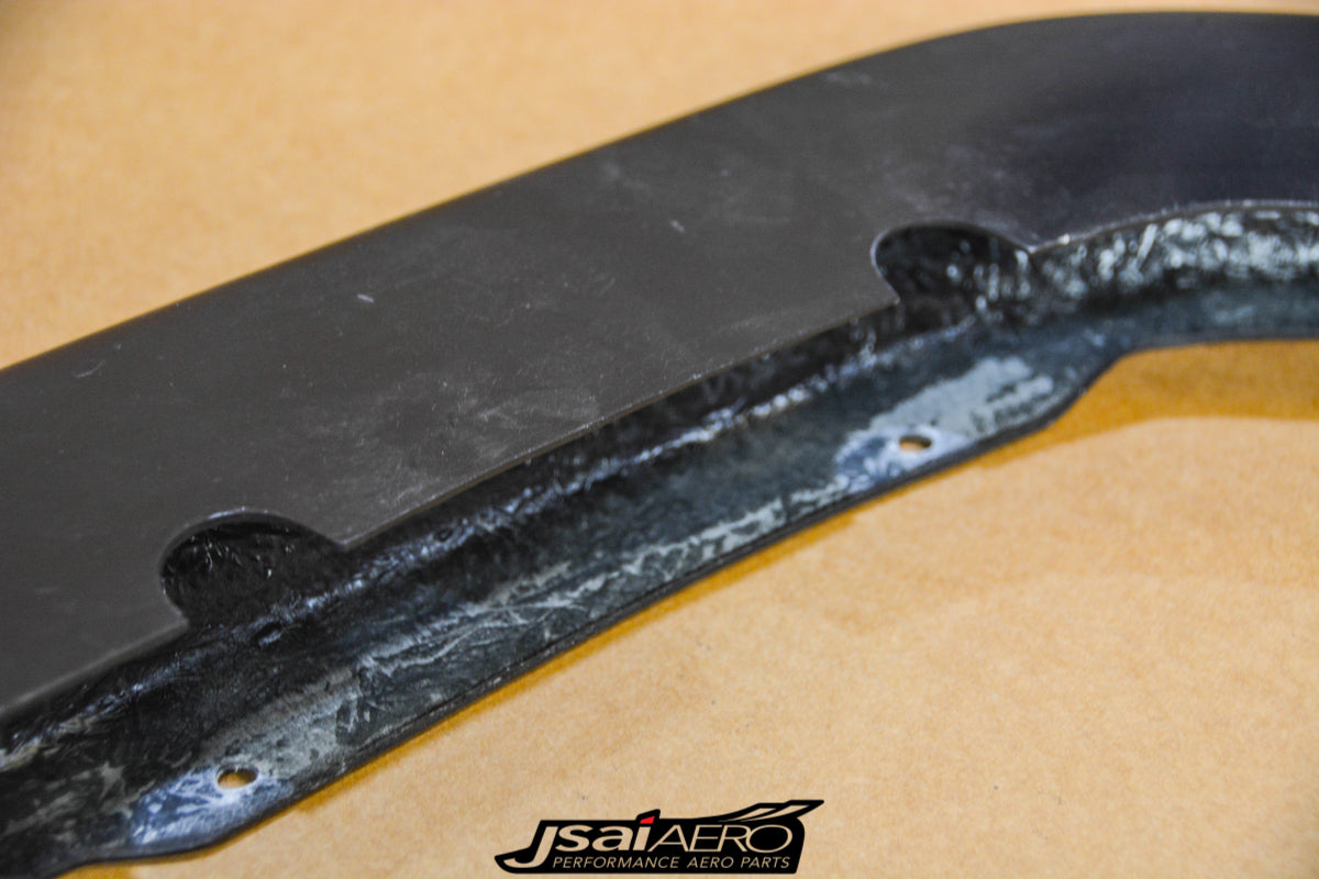 Underside view of a JSAI Aero fibreglass body panel showing mounting points and inner finish