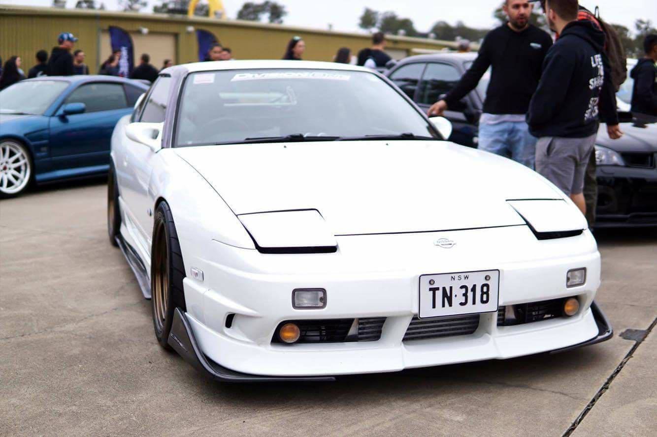 White Nissan 180SX S13 with JSAI Aero performance front lip and aero body kit