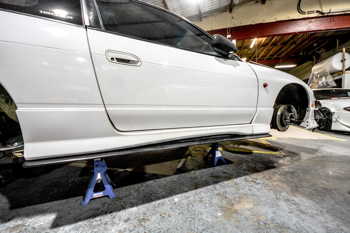 JSAI Aero side skirts installed on Nissan S13 180SX performance aero body kit