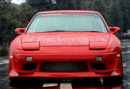 Red Nissan Silvia S13 front view with JSAI Aero performance body kit and front aero styling