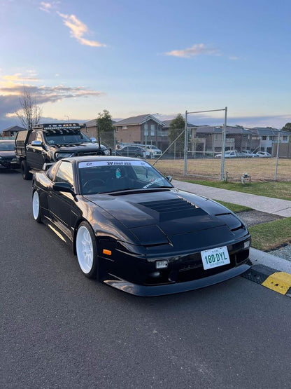Black Nissan Silvia S13 with JSAI Aero performance body kit and front aero styling