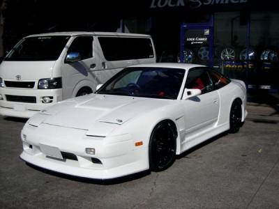 White Nissan Silvia S13 with JSAI Aero performance body kit and front aero styling