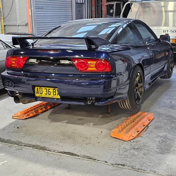 Nissan Silvia S13 rear view with JSAI Aero performance body kit and rear wing installed
