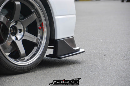 Close-up of JSAI Aero side skirt end cap and splitter extension fitted near the rear wheel of a Nissan Skyline