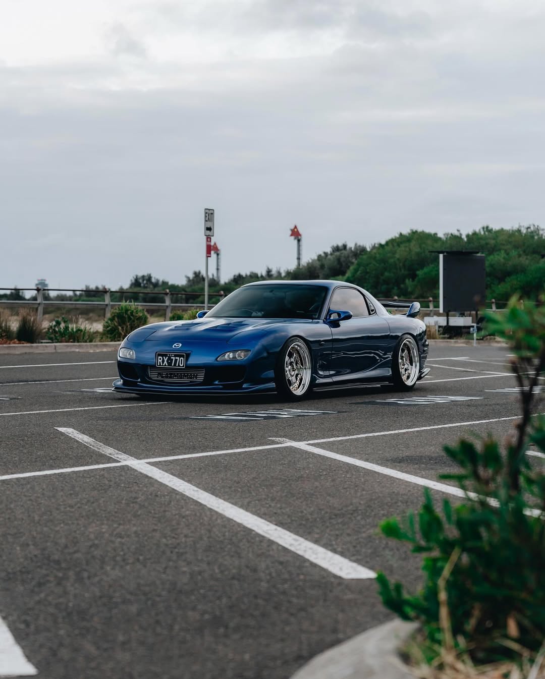 Mazda RX-7 FD featuring JSAI AERO front bumper, side skirts, and rear aero upgrades.