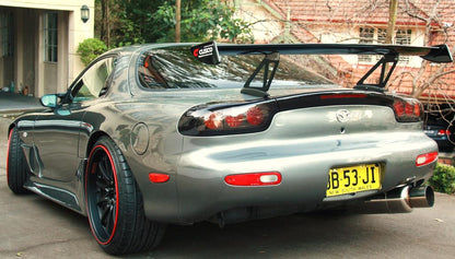 Mazda RX-7 FD3S with JSAI Aero rear lip and side skirts aftermarket body kit rear angle view with wing installed