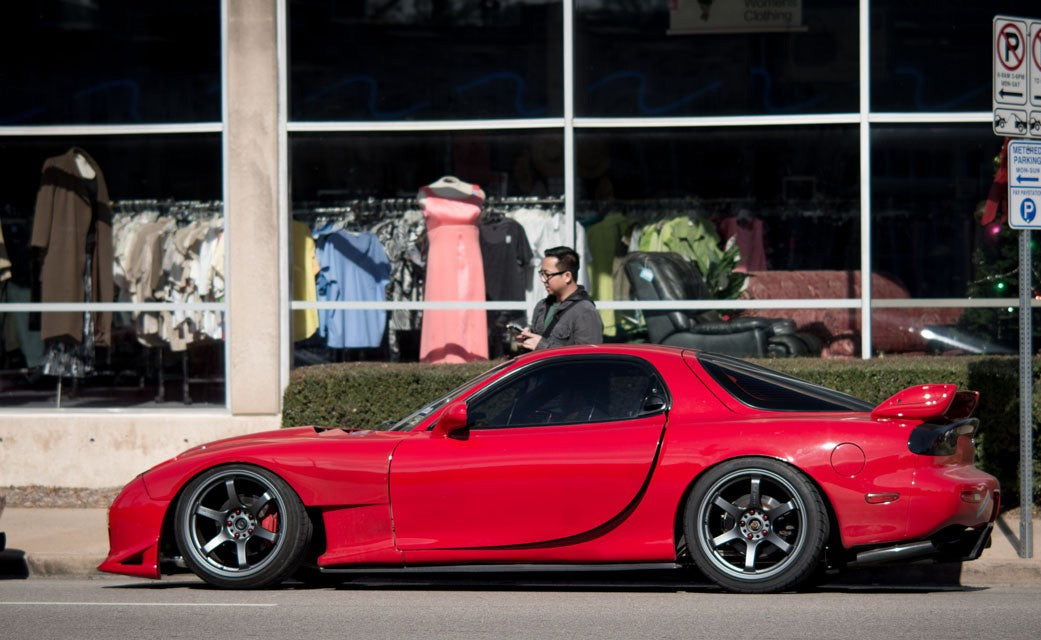 Red Mazda RX-7 FD3S with JSAI Aero side skirts aftermarket body kit full side profile view installed street scene