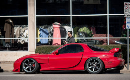 Red Mazda RX-7 FD3S with JSAI Aero side skirts aftermarket body kit full side profile view installed street scene