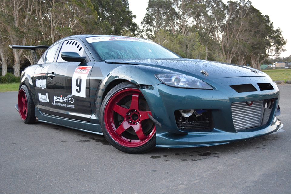 Mazda RX-8 front canards by JSAI Aero installed aftermarket front bumper canards angle view