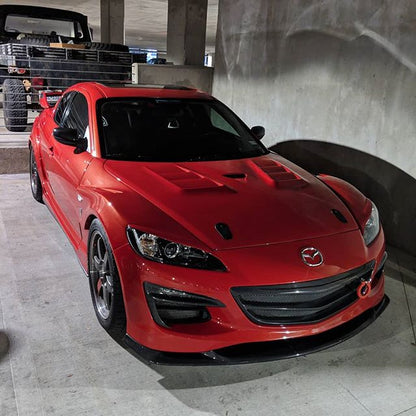 Red Mazda RX-8 with JSAI Aero front lip and side skirts aftermarket body kit front angle view