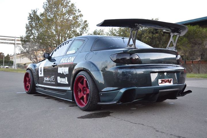 Mazda RX-8 rear diffuser by JSAI Aero installed with mounting screws and brackets aftermarket rear bumper diffuser