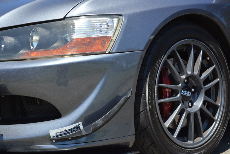 Close-up of Mitsubishi Evo 8 front bumper with JSAI Aero canards installed for improved aerodynamics