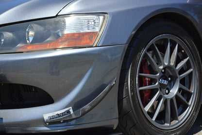 Close-up of Mitsubishi Evo 8 front bumper with JSAI Aero canards installed for improved aerodynamics