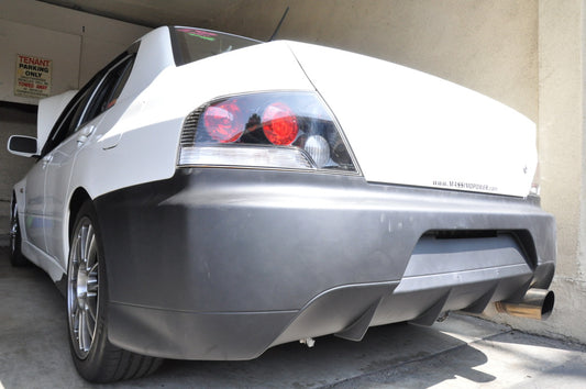 Rear angle view Mitsubishi Lancer Evolution 8 9 aftermarket rear diffuser bumper fitment