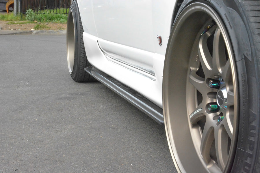 JSAI Aero side skirt extensions designed for Nissan Skyline R33 GTS-T, enhancing aerodynamic styling and side profile for R33 performance body kit upgrades.