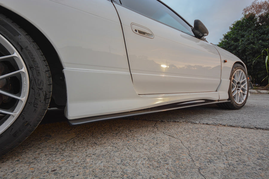 JSAI Aero side skirts installed on Nissan S13 180SX performance aero body kit