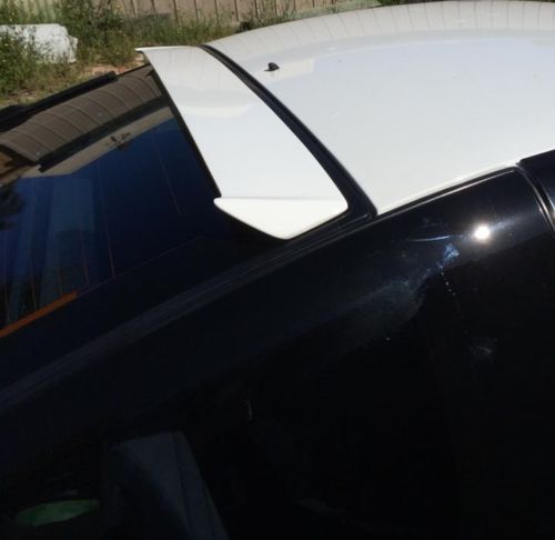 Nissan S13 with DMAX roof spoiler installed for improved aerodynamics and rear styling