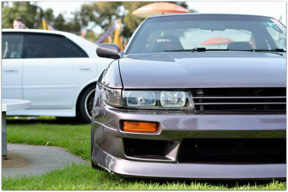 Front view of Nissan S14 Silvia 200SX with aftermarket aero front bumper body kit