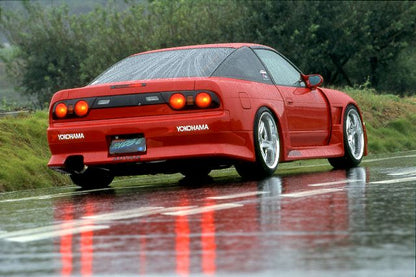 Red Nissan Silvia S13 with JSAI Aero performance body kit and rear aero styling
