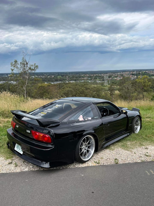 Black Nissan Silvia S13 with JSAI Aero performance body kit and aero parts installed
