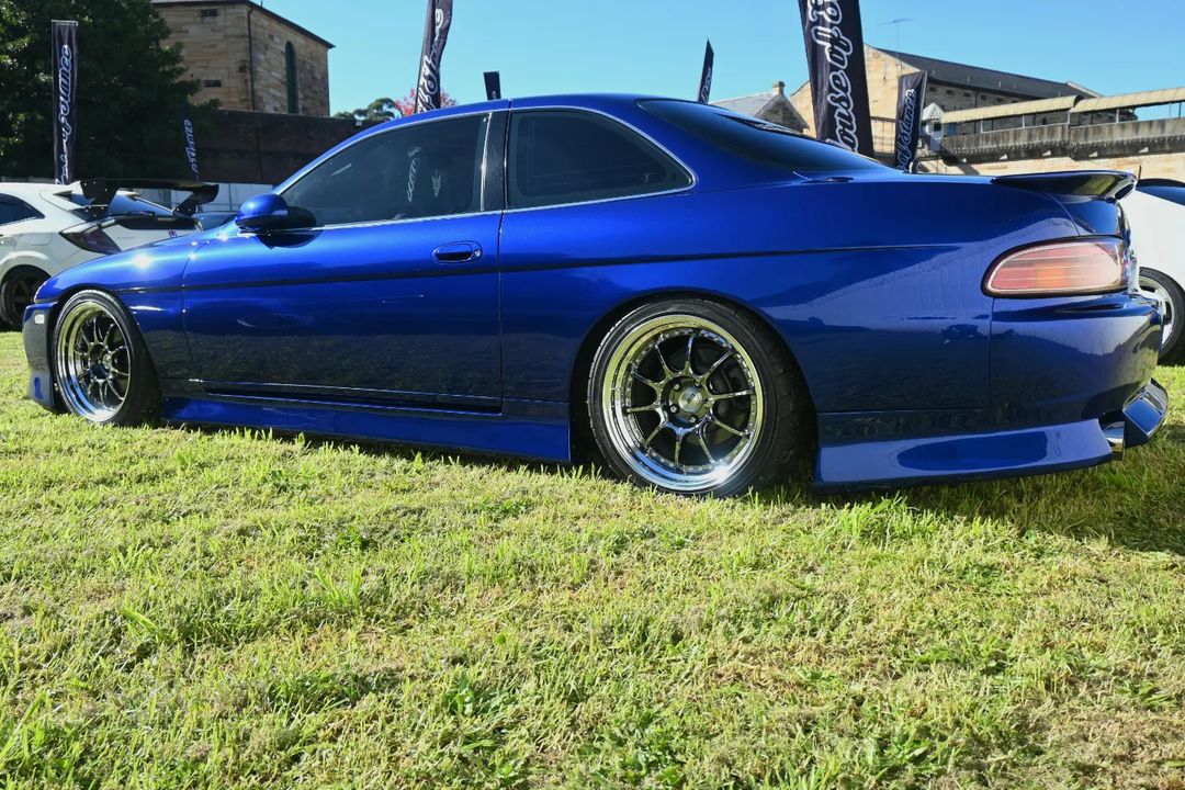 modified Nissan Silvia S14 blue side skirts rear pods aftermarket aero kit show car stance