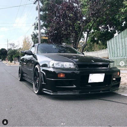 Nissan Skyline R34 front bumper by JSAI featuring aerodynamic performance upgrade and aggressive front-end styling