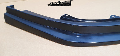 Angled close-up of JSAI Aero front lip splitter for Nissan Skyline R34 aftermarket body kit
