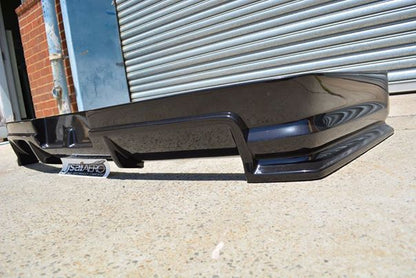 Low angle view of JSAI Aero rear bumper diffuser for Nissan Skyline R34 aftermarket body kit