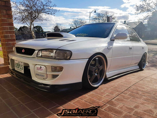 Subaru Impreza GC8 WRX with JSAI Aero front lip and side skirts aftermarket body kit front angle view