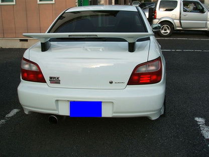 Rear view of Subaru Impreza GDB WRX with 90mm Zero Sports style wing risers by JSAI Aero installed aftermarket spoiler risers