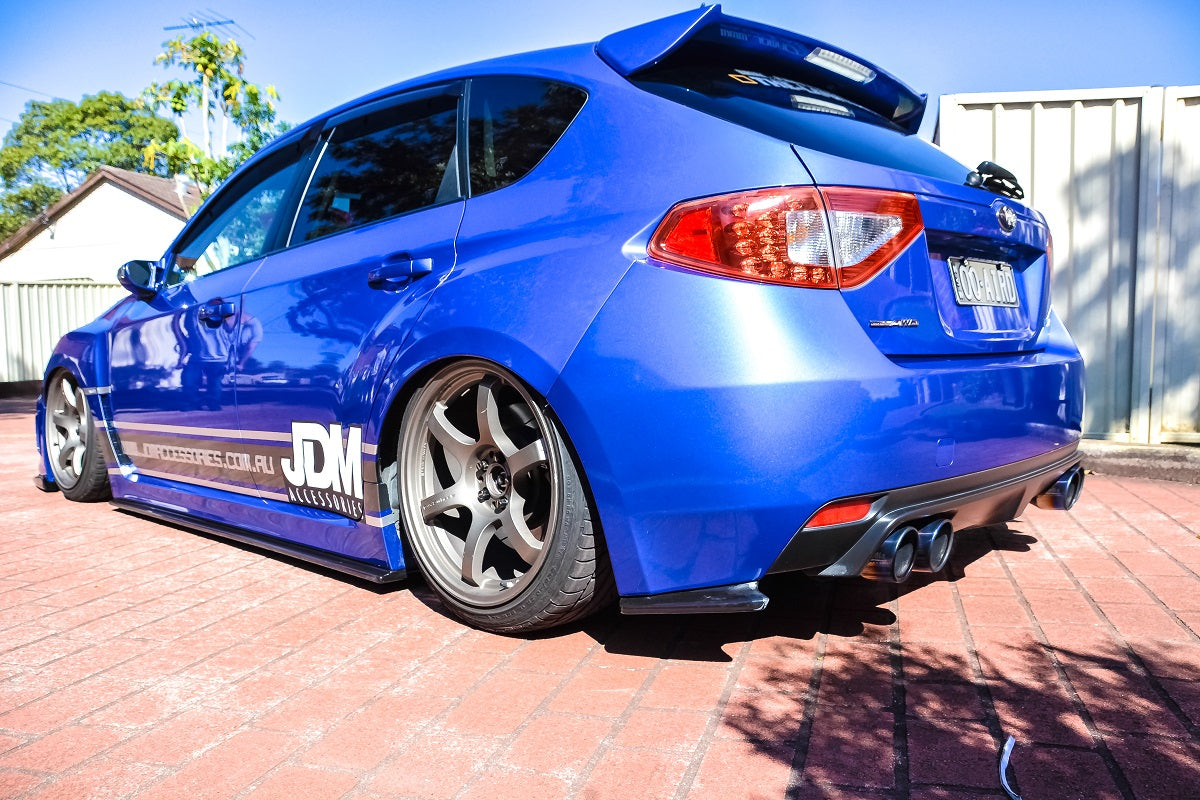 Subaru Impreza GRB hatch with JSAI Aero side skirts and rear diffuser aftermarket body kit rear angle view