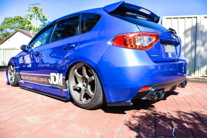 Subaru Impreza GRB hatch with JSAI Aero side skirts and rear diffuser aftermarket body kit rear angle view