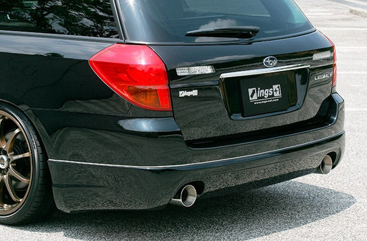 Subaru Legacy wagon rear bumper detail with pod extensions and exhaust tips