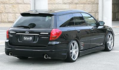 Subaru Liberty Legacy wagon with JSAI Aero side skirts and rear extensions aftermarket body kit rear angle view