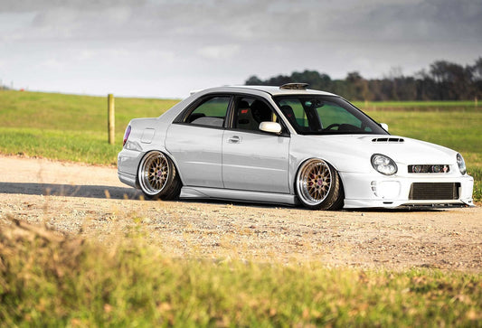 detailed view aftermarket 3-piece front lip splitter Subaru WRX Bug Eye 2001 2002